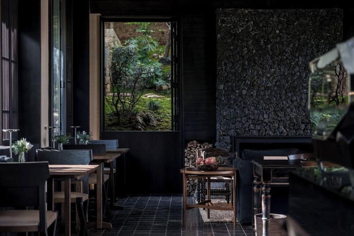 Imagen del bar/restaurante del Hotel MistyHues DawnGreen. Foto 4