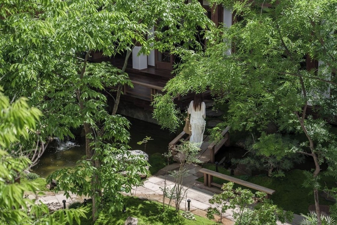 Imagen de los exteriores del Hotel MistyHues DawnGreen. Foto 11