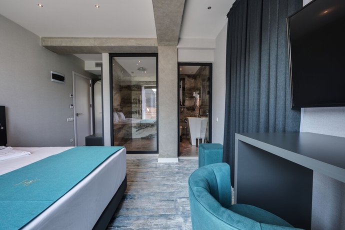 Imagen de la habitación del Hotel Mit. Foto 1