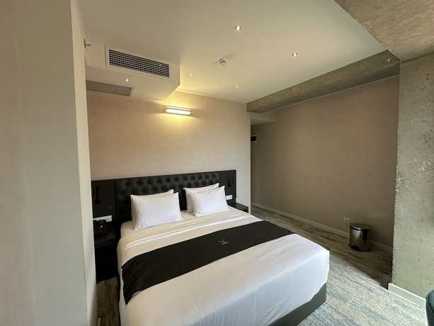 Imagen de la habitación del Hotel Mit. Foto 4