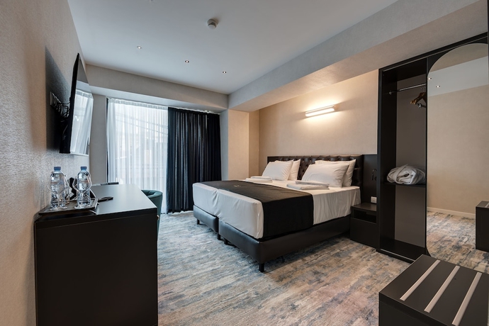 Imagen de la habitación del Hotel Mit. Foto 5