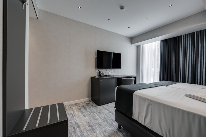 Imagen de la habitación del Hotel Mit. Foto 11