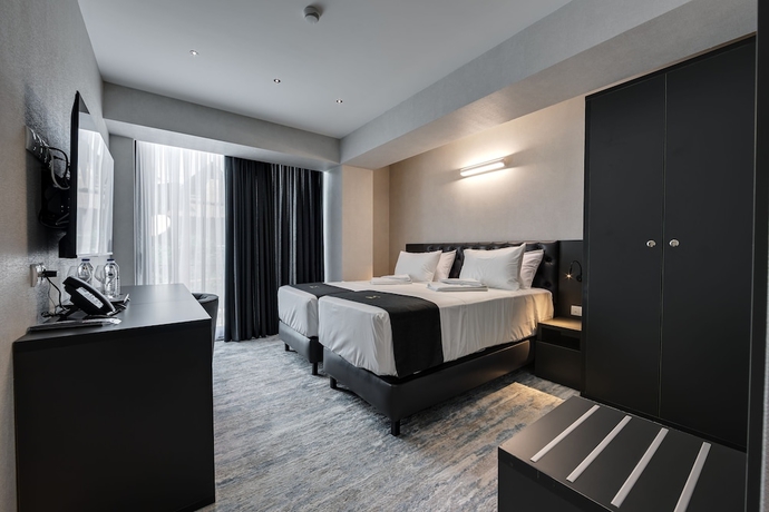 Imagen de la habitación del Hotel Mit. Foto 12