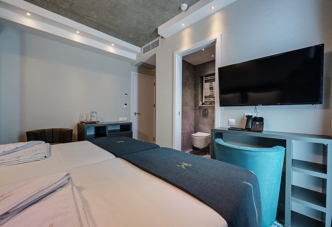 Imagen de la habitación del Hotel Mit. Foto 14