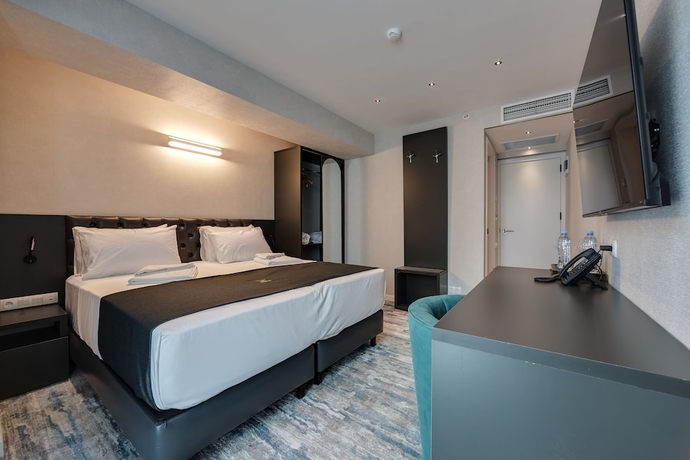 Imagen de la habitación del Hotel Mit. Foto 15