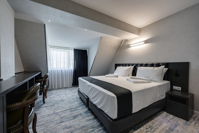 Imagen de la habitación del Hotel Mit. Foto 16