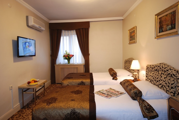 Imagen de la habitación del Hotel Mithat. Foto 6