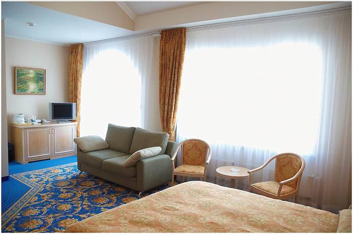 Imagen de la habitación del Hotel Mithos hotel. Foto 13