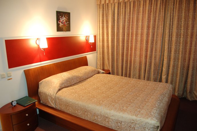 Imagen de la habitación del Hotel Mithos hotel. Foto 16