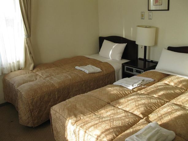 Imagen de la habitación del Hotel Mito Riverside. Foto 16