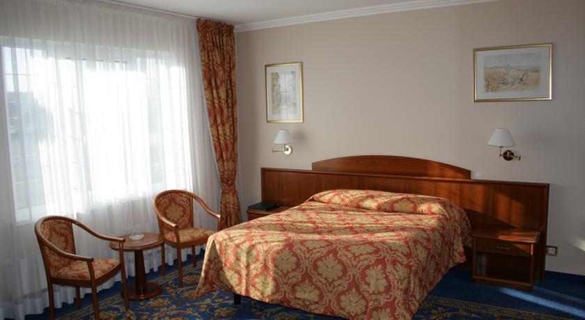 Imagen de la habitación del Hotel Mitos Hotel. Foto 6