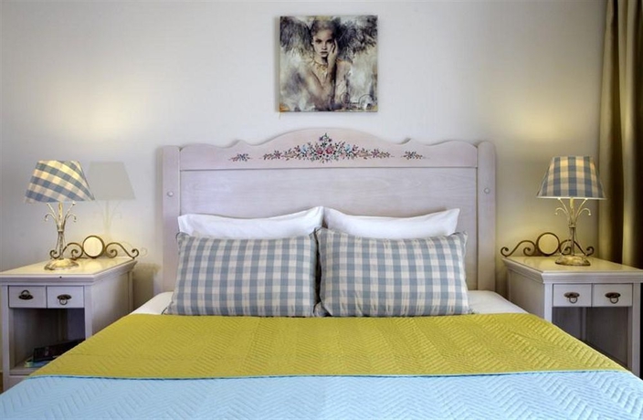 Imagen de la habitación del Hotel Mitos Suites. Foto 3