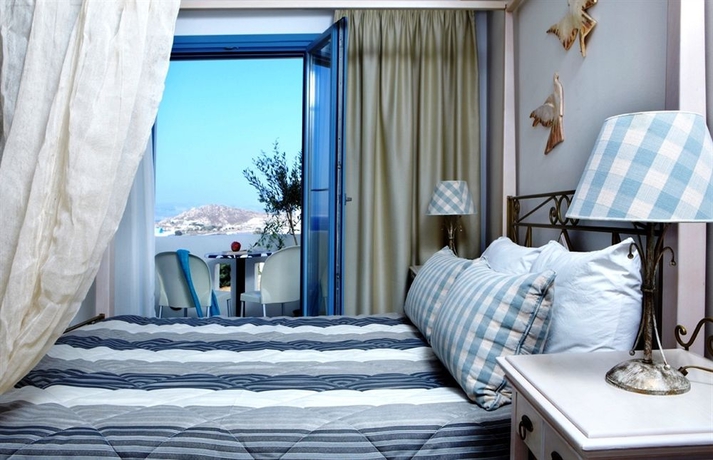 Imagen de la habitación del Hotel Mitos Suites. Foto 9