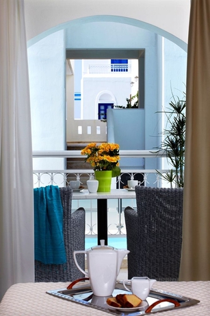 Imagen de la habitación del Hotel Mitos Suites. Foto 11