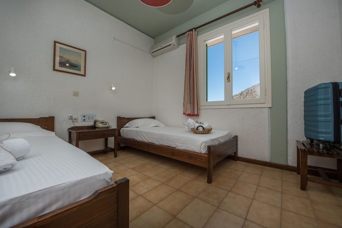 Imagen de la habitación del Hotel Mitos Village. Foto 12