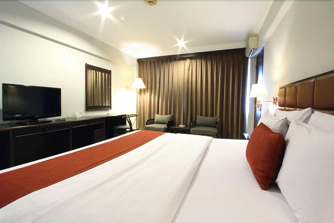 Imagen de la habitación del Hotel Mitra Bandung. Foto 11