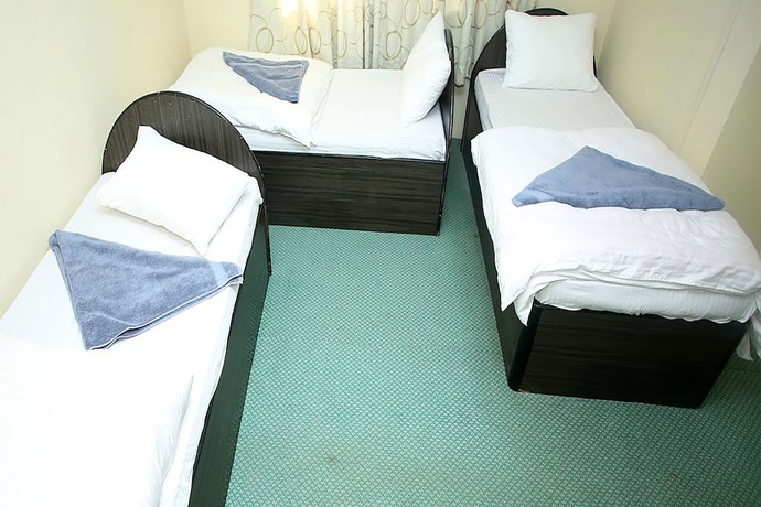 Imagen de la habitación del Hotel Mitra garden Inn. Foto 10