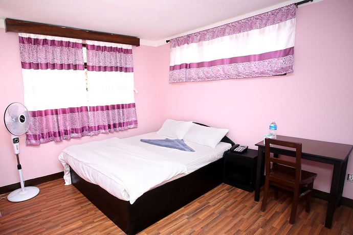 Imagen de la habitación del Hotel Mitra garden Inn. Foto 12
