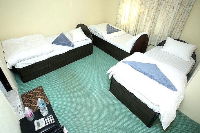 Imagen de la habitación del Hotel Mitra garden Inn. Foto 13