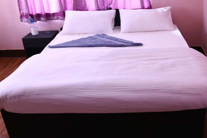 Imagen de la habitación del Hotel Mitra garden Inn. Foto 15