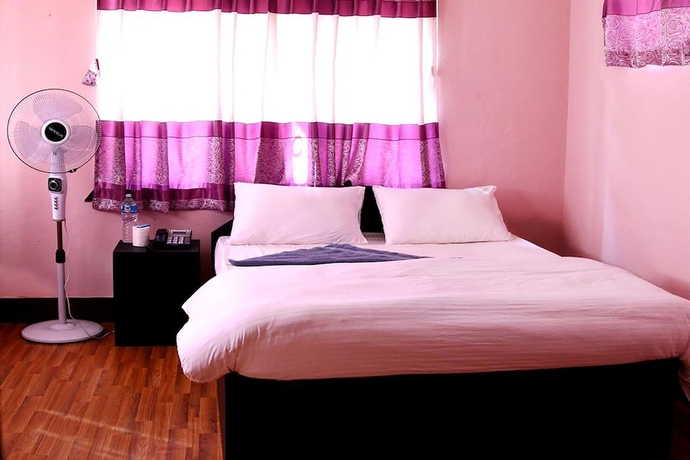Imagen de la habitación del Hotel Mitra garden Inn. Foto 16