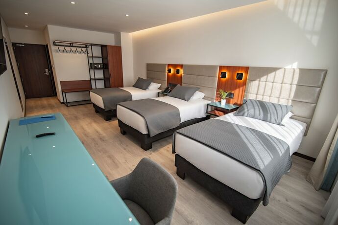 Imagen de la habitación del Hotel Mitru Express. Foto 15