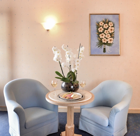 Imagen de la habitación del Hotel Mitsis Galini. Foto 7