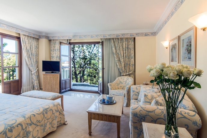 Imagen de la habitación del Hotel Mitsis Galini. Foto 11