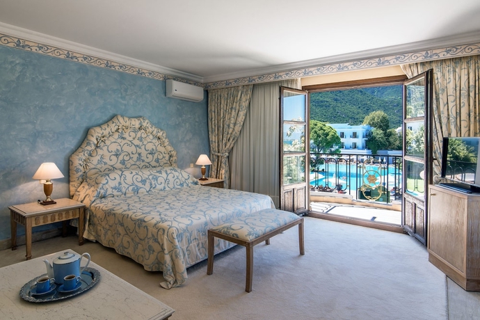 Imagen de la habitación del Hotel Mitsis Galini. Foto 13