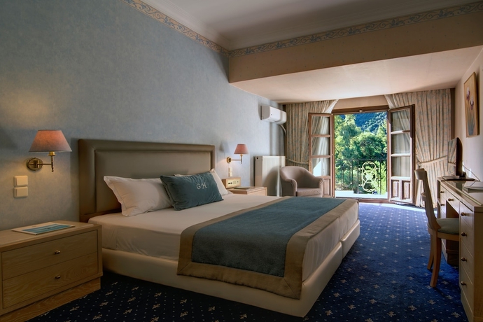 Imagen de la habitación del Hotel Mitsis Galini. Foto 14