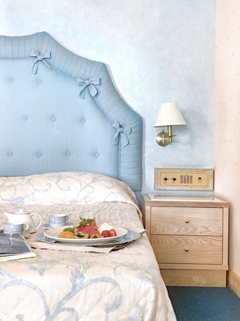 Imagen de la habitación del Hotel Mitsis Galini. Foto 16