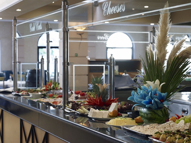 Imagen del bar/restaurante del Hotel Mitsis Norida Beach - All Inclusive. Foto 3