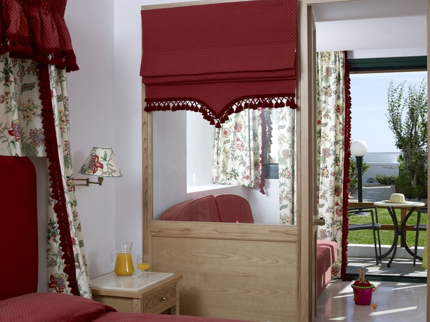 Imagen de la habitación del Hotel Mitsis Rinela. Foto 8