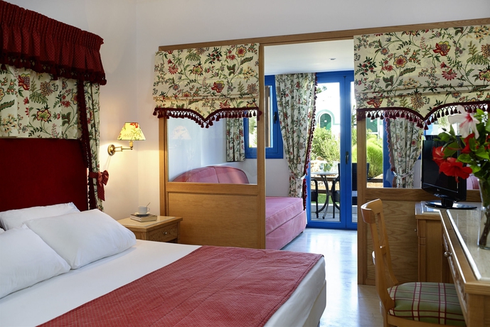 Imagen de la habitación del Hotel Mitsis Rinela. Foto 9