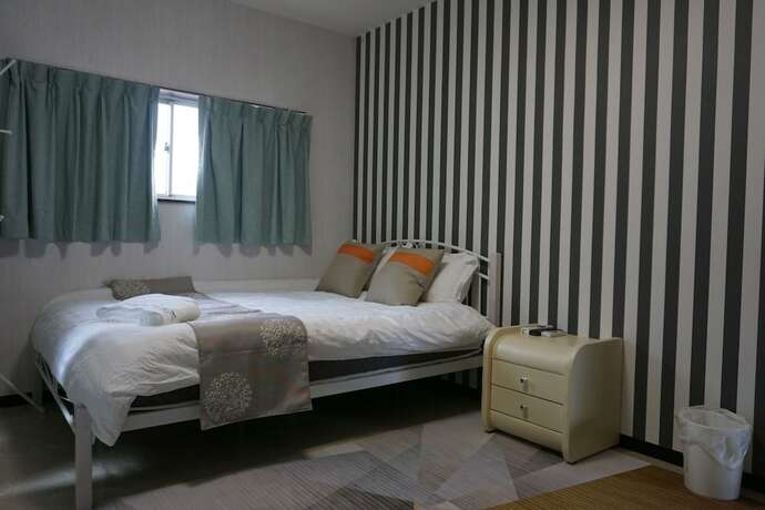 Imagen de la habitación del Hotel Mitsuba. Foto 17