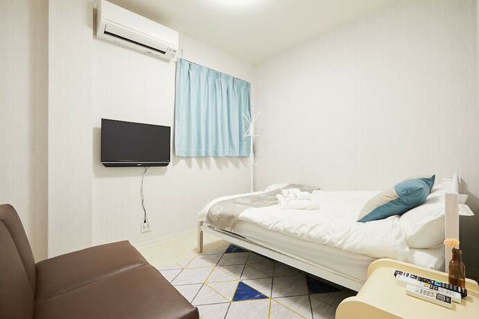 Imagen de la habitación del Hotel Mitsuba. Foto 18
