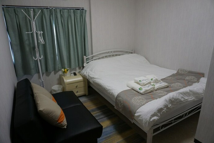 Imagen de la habitación del Hotel Mitsuba. Foto 20