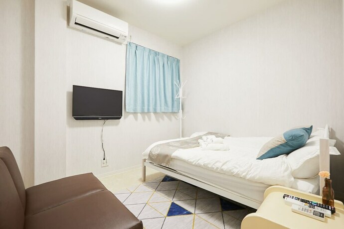 Imagen de la habitación del Hotel Mitsuba. Foto 22
