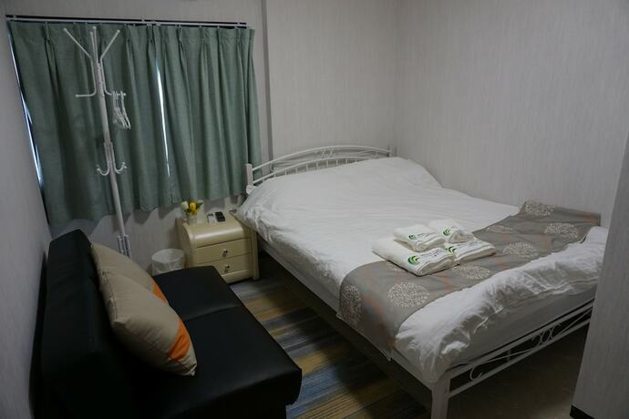 Imagen de la habitación del Hotel Mitsuba. Foto 23