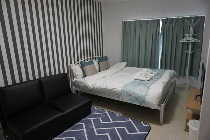 Imagen de la habitación del Hotel Mitsuba. Foto 27