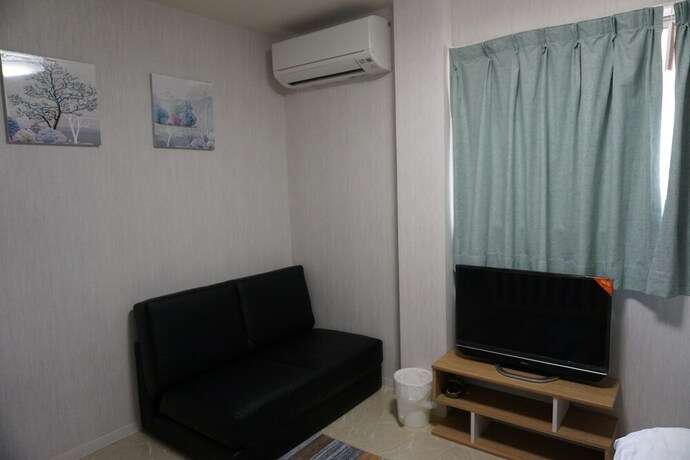 Imagen de la habitación del Hotel Mitsuba. Foto 30