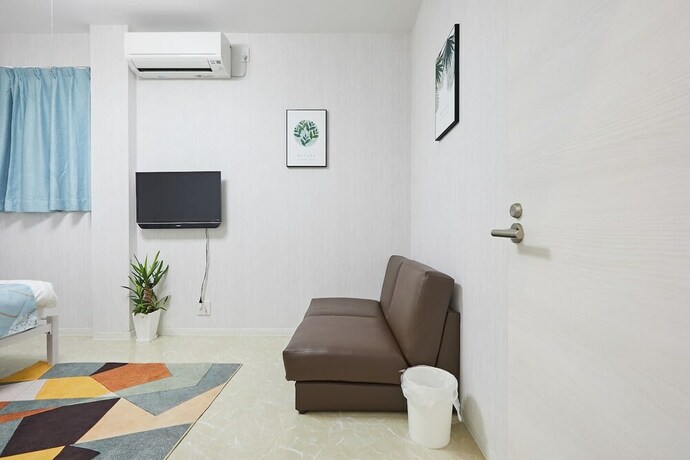 Imagen de la habitación del Hotel Mitsuba. Foto 31