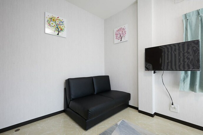 Imagen de la habitación del Hotel Mitsuba. Foto 32