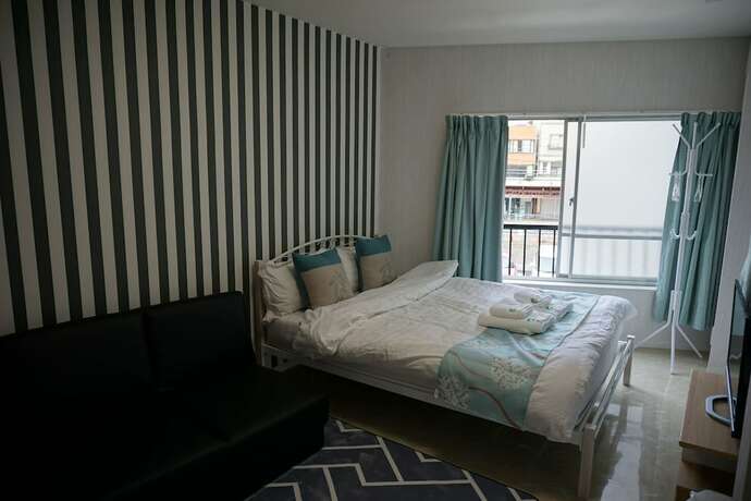 Imagen de la habitación del Hotel Mitsuba. Foto 34