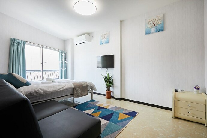Imagen de la habitación del Hotel Mitsuba. Foto 35