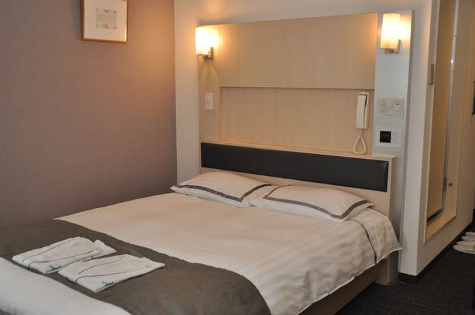Imagen de la habitación del Hotel Miwa. Foto 11