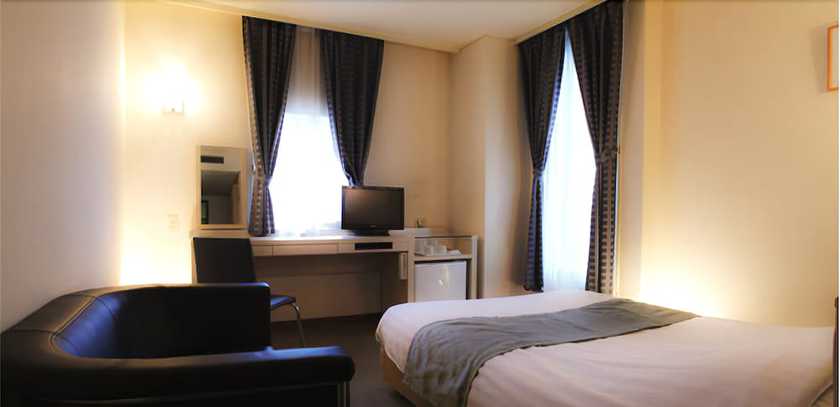 Imagen de la habitación del Hotel Miwa. Foto 14