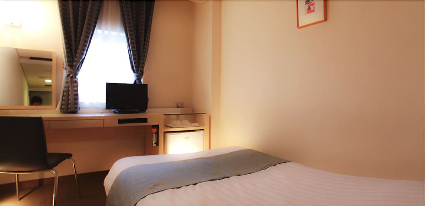 Imagen de la habitación del Hotel Miwa. Foto 15