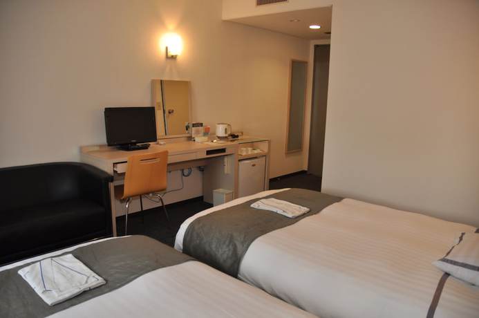 Imagen de la habitación del Hotel Miwa. Foto 16