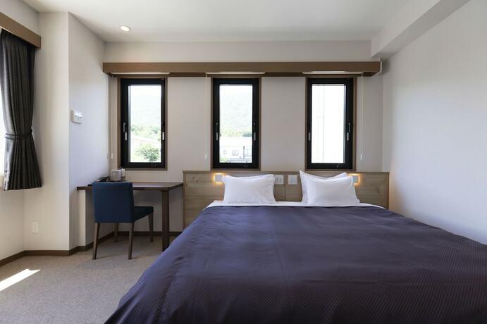 Imagen de la habitación del Hotel Miyajima Hanarenoyado IBUKU. Foto 22